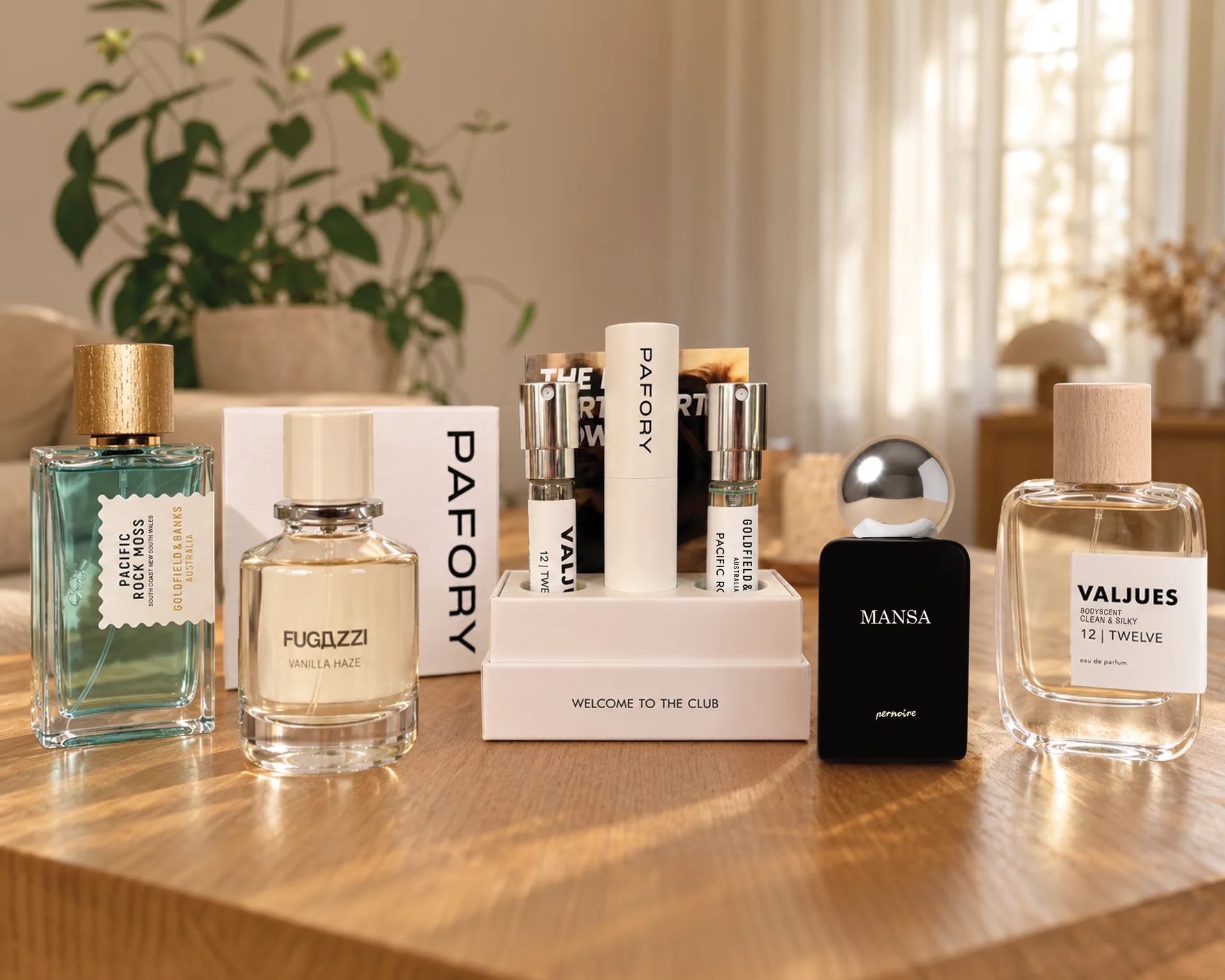 PAFORY Starter Set with Member Box, white case and two 8 ml scents, next to original bottles by Goldfield & Banks, Fugazzi, pernoire and Valjues