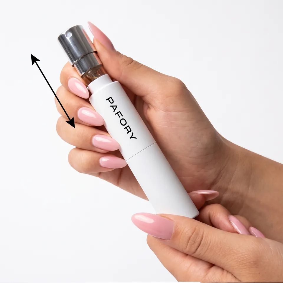 Hand sliding the vial into the white PAFORY case