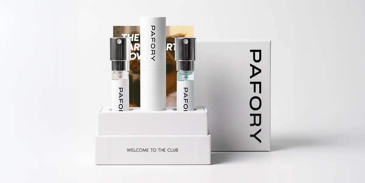 The PAFORY Member Box with the white case and two 8 ml scents, next to its packaging